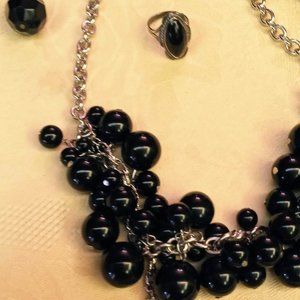 Necklace Earrings and silver ring set.